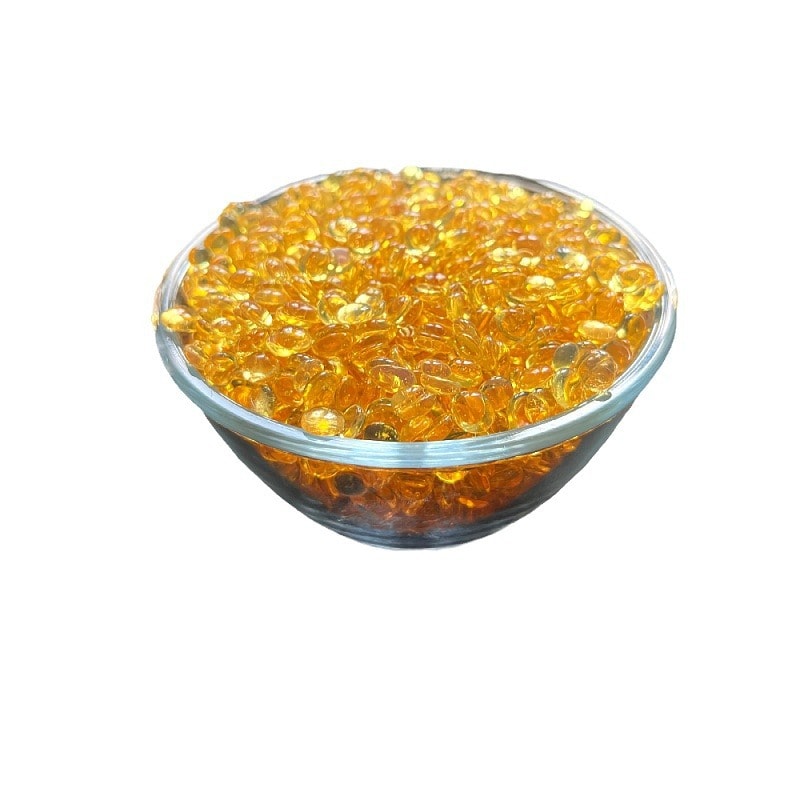 Multiple hot melt glue sticks arranged neatly on a white background, emphasizing their uniform size and smooth finish.