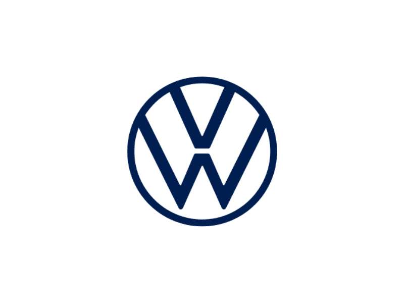 Technician operating equipment for applying thermal interface material onto industrial components in a controlled production environment.